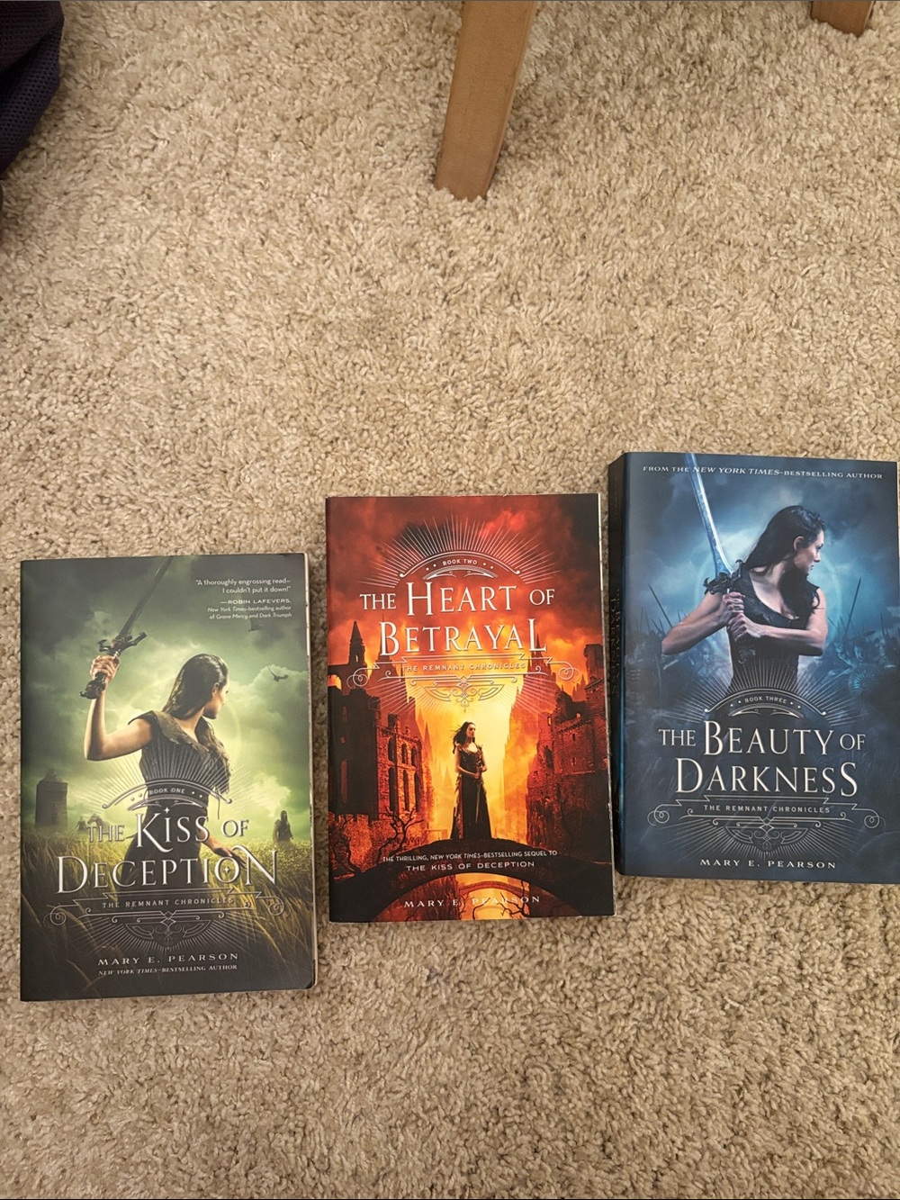 The Heart of Betrayal by Mary E. Pearson - Orange Fantasy Paperback